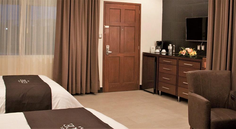 Hotel Ecce Inn & Spa Silao Exterior foto A typical room at the hotel