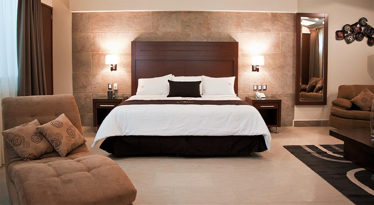 Hotel Ecce Inn & Spa Silao Exterior foto A bedroom at the hotel